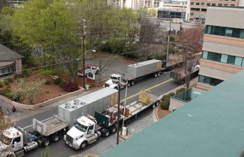 Trucks with industrial HVAC units.