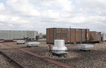 Industrial HVAC systems on rooftop. Equipment retrofits.